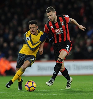 AFC Bournemouth V Arsenal 2016-17 Prints: Intense Face-Off: Alexis Sanchez vs. Simon Francis in Premier League Battle