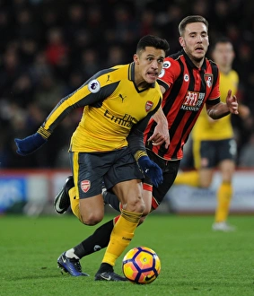 AFC Bournemouth V Arsenal 2016-17 Prints: Intense Face-Off: Alexis Sanchez vs. Dan Gosling - Premier League Showdown