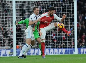 Images Dated 26th December 2016: Intense Face-Off: Giroud vs. McAuley in Arsenal's Premier League Battle