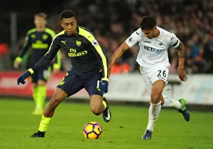 Swansea City V Arsenal - 2016-17 Prints: Intense Face-Off: Iwobi vs Naughton in Swansea-Arsenal Premier League Clash