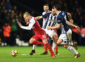 West Bromwich Albion v Arsenal 2017-18 Collection: Intense Face-Off: Jack Wilshere vs. Jay Rodriguez and Gareth Barry in Arsenal vs