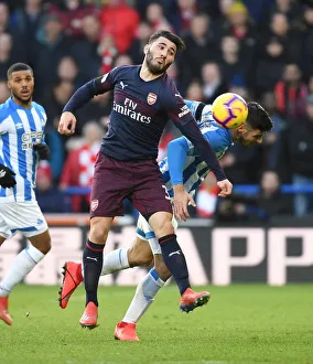 Intense Face-Off: Kolasinac vs. Schindler in Arsenal's Premier League Battle