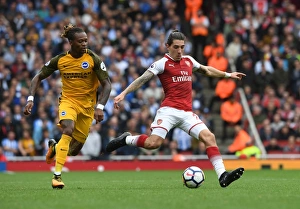 Arsenal V Brighton And Hove Albion 2017-18 Prints: Intense Face-Off: Lacazette vs. Bong in Arsenal's Premier League Battle