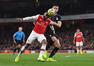 Arsenal V Crystal Palace 2019-20 Prints: Intense Face-off: Lacazette vs. Cahill - Arsenal vs. Crystal Palace Premier League Clash