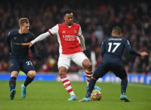 Intense Face-Off: Magalhaes vs. Vydra in Arsenal's Battle Against Burnley