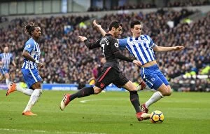 Brighton & Hove Albion v Arsenal 2017-18 Collection: Intense Face-Off: Mkhitaryan vs. Dunk in Premier League Clash between Arsenal and Brighton