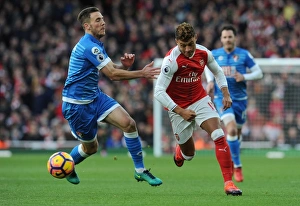 Arsenal V AFC Bournemouth 2016/17 Prints: Intense Face-Off: Oxlade-Chamberlain vs