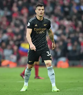 Intense Midfield Battle: Granit Xhaka Fights It Out Against Liverpool in the Premier League 2022-23