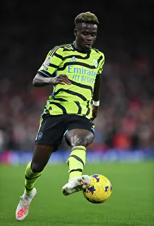 Liverpool V Arsenal 2023-24 Prints: Intense Moment: Bukayo Saka in Action - Liverpool vs. Arsenal, Premier League 2023-24