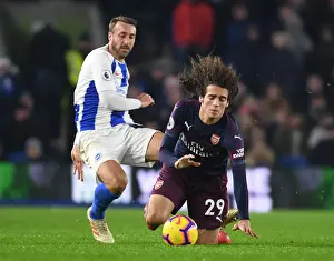 Brighton And Hove Albion V Arsenal 2018-19 Prints: Intense Moment: Guendouzi Tripped by Murray in Premier League Clash between Brighton and Arsenal (2018-19)