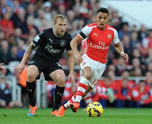 Arsenal V Burnley 2014/15 Prints: Intense Rivalry: Alexis Sanchez vs. Scott Arfield - Arsenal's Battle Against Burnley