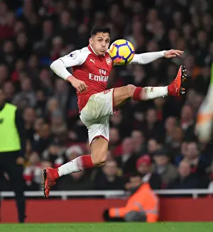 Arsenal V Liverpool 2017-18 Prints: Intense Rivalry: Alexis Sanchez's Battle at Emirates Stadium - Arsenal vs Liverpool (2017-18)