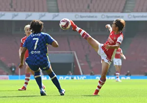Arsenal Women V Chelsea Women 2021-22 Prints: Intense Rivalry: Arsenal Women vs. Chelsea Women Battle it Out in FA WSL Match