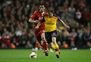 Intense Rivalry: Arshavin and Arbeloa Face Off in the 4-4 Liverpool vs. Arsenal Thriller, Barclays Premier League, Anfield, 2009