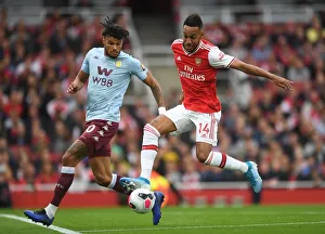 Intense Rivalry: Aubameyang vs. Mings - Arsenal vs. Aston Villa Face-Off