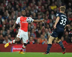 Arsenal V Southampton, League Cup 2014/15 Prints: Intense Rivalry: Campbell vs. Targett in Arsenal's Capital One Cup Showdown
