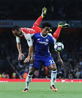 Arsenal V Chelsea 2016-17 Prints: Intense Rivalry: Cazorla Soars Past Willian in Arsenal vs. Chelsea Clash (2016-17)