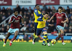 West Ham United V Arsenal 2014-15 Prints: Intense Rivalry: Cazorla and Welbeck vs. Song and Tomkins at the Boleyn Ground
