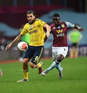 Aston Villa V Arsenal 2019-20 Prints: Intense Rivalry: Ceballos vs Nakamba - A Battle to Remember