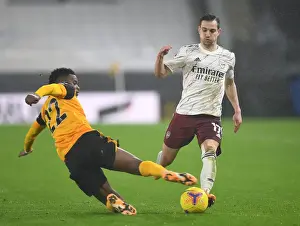 Intense Rivalry: Cedric Soares vs Nelson Semedo Battle at Wolverhampton Wanderers vs Arsenal