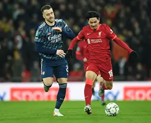 Intense Rivalry: Chambers vs Minamino - Carabao Cup Semi-Final Showdown between Liverpool and Arsenal