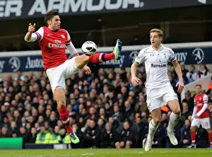 Tottenham Hotspur V Arsenal 2012-13 Prints: Intense Rivalry: Giroud vs Dawson at White Hart Lane - Arsenal vs Tottenham