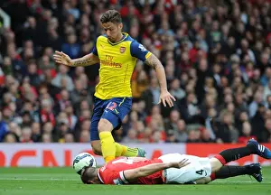 Manchester United V Arsenal 2014-15 Prints: Intense Rivalry: Giroud vs Jones at Old Trafford - Manchester United vs Arsenal