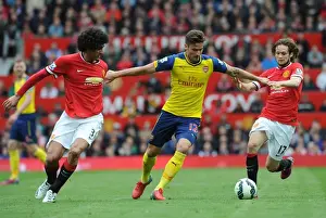 Manchester United V Arsenal 2014-15 Prints: Intense Rivalry: Giroud's Battle with Herrera and Fellaini (Man Utd vs Arsenal)