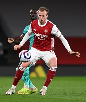Intense Rivalry: Holding vs. Mane - Arsenal vs. Liverpool's Battle in the Premier League 2020-21