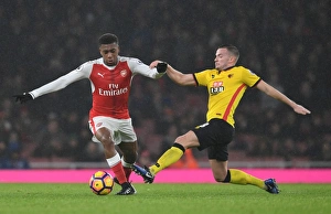 Arsenal V Watford 2016-17 Prints: Intense Rivalry: Iwobi vs. Cleverley in Arsenal vs. Watford Premier League Showdown