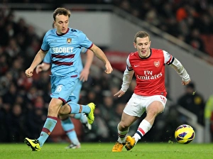 Intense Rivalry: Jack Wilshere vs. Mark Noble Battle in Arsenal vs. West Ham Showdown