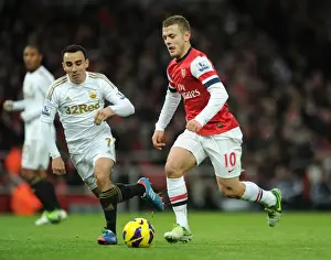 Intense Rivalry: Jack Wilshere vs Leon Britton Clash in the 2012-13 Premier League