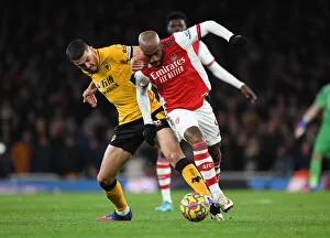 Intense Rivalry: Lacazette vs. Coady - Arsenal vs. Wolverhampton Wanderers, Premier League Showdown