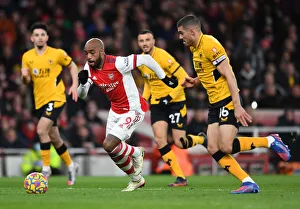 Intense Rivalry: Lacazette vs. Coady - Arsenal vs. Wolverhampton Wanderers, Premier League Clash