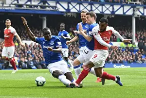 Everton V Arsenal 2018-19 Prints: Intense Rivalry: Lacazette's Determination Against Zouma and Coleman's Pressure at Everton vs Arsenal