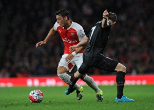 Intense Rivalry: Milner Trips Ozil in Arsenal vs. Liverpool Clash (2015/16)
