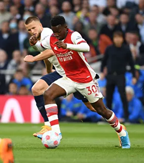 Tottenham Hotspur V Arsenal 2021-22 Prints: Intense Rivalry: Nketiah vs. Dier - Arsenal vs. Tottenham Clash (2021-22)