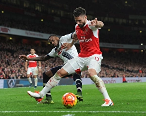 Arsenal V Tottenham Hotspur 2015-16 Prints: Intense Rivalry: Olivier Giroud vs. Danny Rose Battle at Arsenal vs. Tottenham (2015-16)