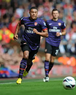 Liverpool V Arsenal 2012-13 Prints: Intense Rivalry: Oxlade-Chamberlain Faces Liverpool in Premier League Showdown (2012)