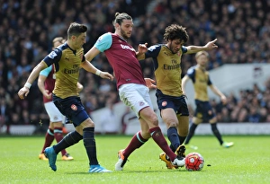 West Ham United V Arsenal 2015-16 Prints: Intense Rivalry: Ozil, Elneny vs