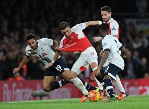 Images Dated 8th November 2015: Intense Rivalry: Ozil vs. Dembele Clash at the Emirates