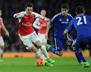 Images Dated 24th January 2016: Intense Rivalry: Ozil vs. Matic & Oscar in Arsenal vs. Chelsea Clash