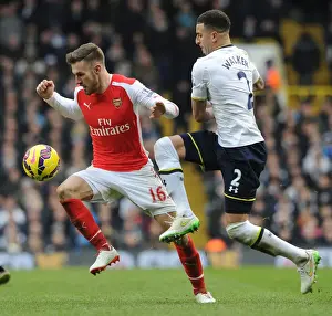 Tottenham Hotspur V Arsenal 2014-15 Prints: Intense Rivalry: Ramsey Foul in the Premier League Showdown between Arsenal and Tottenham (2014-15)