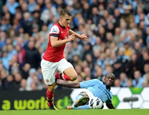 Intense Rivalry: Ramsey vs Toure Battle at Etihad Stadium (1:1)