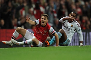 Intense Rivalry: Ramsey vs. Vaz Te Clash at the Emirates