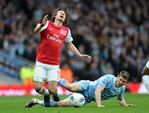 Images Dated 8th April 2012: Intense Rivalry: Rosicky vs Milner - The Famous Foul in the Arsenal vs Manchester City Clash (2012)