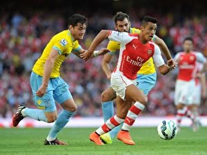 Images Dated 16th August 2014: Intense Rivalry: Sanchez vs. Ward - Arsenal vs. Crystal Palace Face-Off