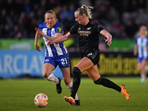 Brighton And Hove Albion Women V Arsenal Women 2022-23 Prints: Intense Rivalry: Stina Blackstenius Faces Off Against Zoe Morse in FA Women's Super League Clash