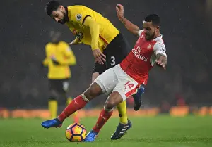Arsenal V Watford 2016-17 Prints: Intense Rivalry: Walcott vs. Britos in Arsenal's Battle Against Watford
