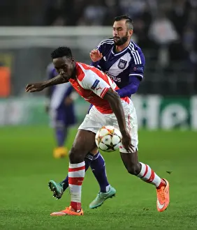 Anderlecht V Arsenal 2014-15 Prints: Intense Rivalry: Welbeck vs. Defour - Arsenal's Champions League Battle